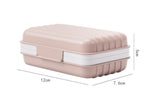 Draining travel soap dish with snaping lid and removeable draining tray in pink